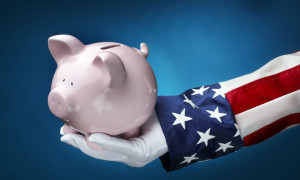 Uncle Sam holding piggy bank_money_economics