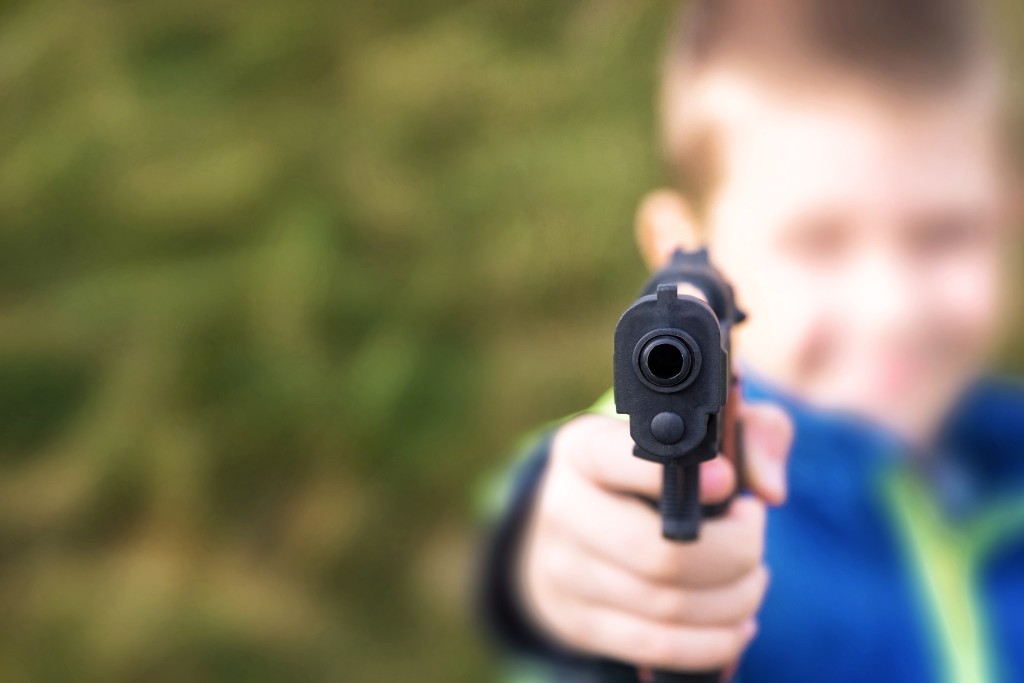 child with a gun