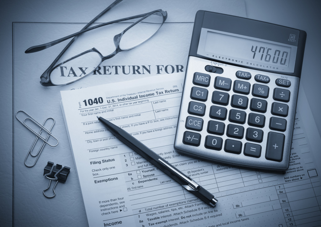 tax documents and calculator