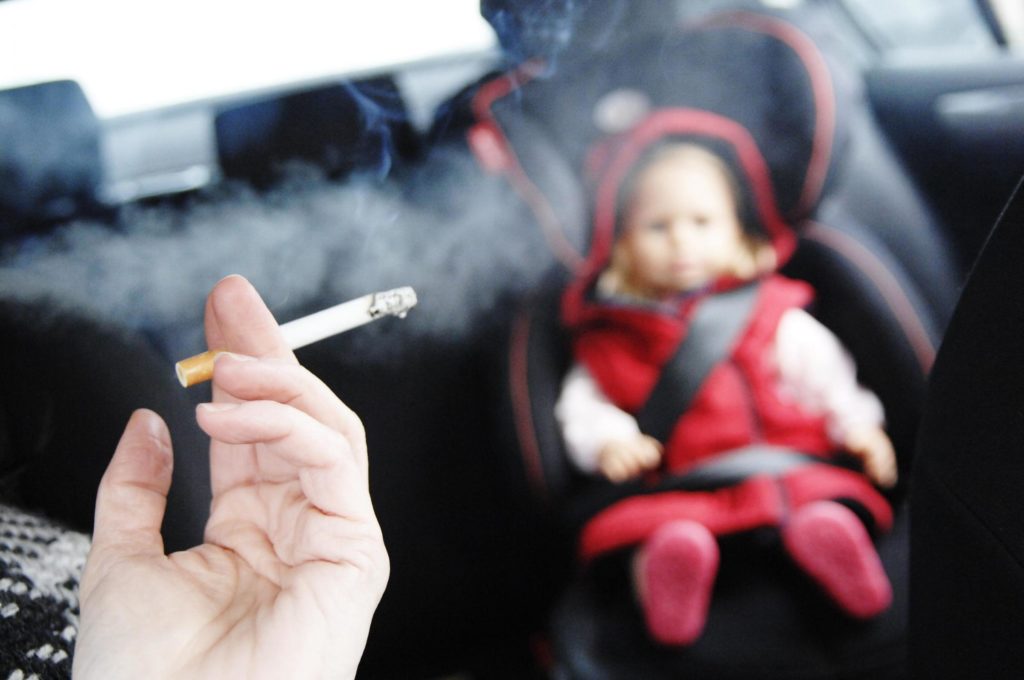 smoking in car with child
